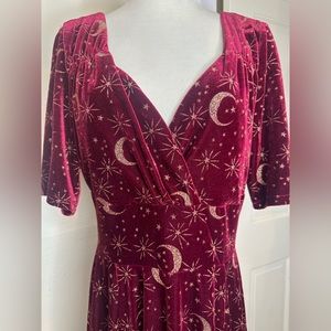 Burgundy stretch velvet  Collectif gold moon and star pin up dress.